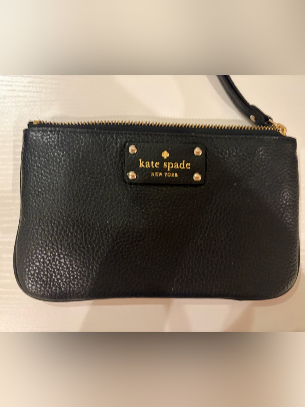 kate spade Black Pebbled Leather Wristlet with Gold Plaque